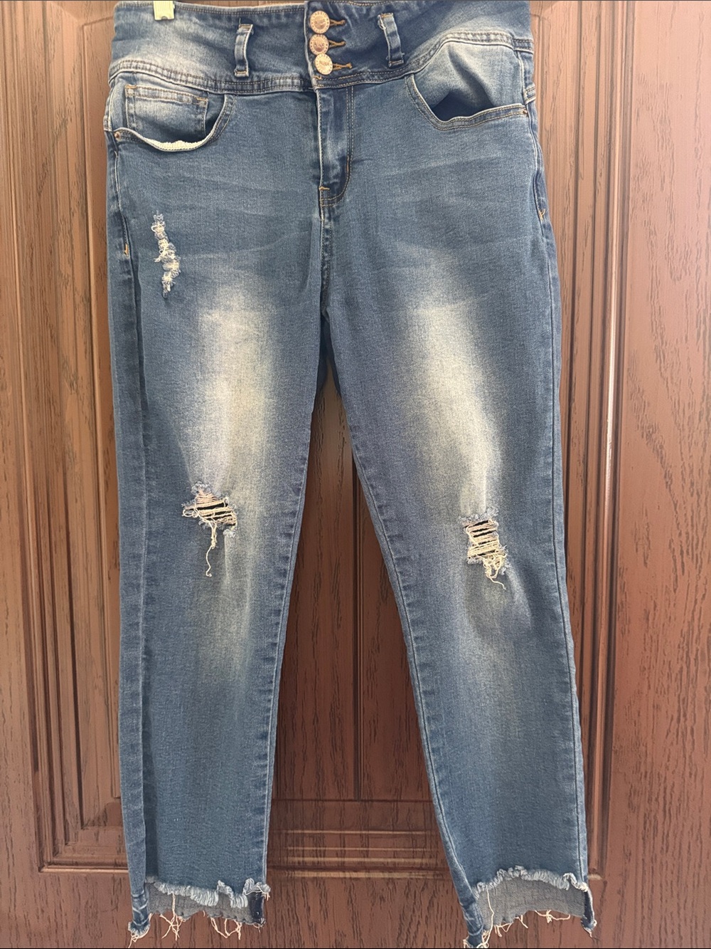 Distressed Blue Skinny Jeans with Frayed Hem